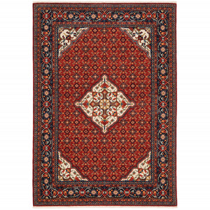 8' X 11' Red Blue Ivory And Orange Oriental Power Loom Stain Resistant Area Rug With Fringe