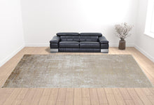 3' X 5' Taupe Ivory And Gold Abstract Power Loom Distressed Area Rug With Fringe