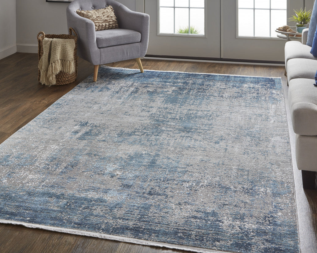 3' X 5' Taupe Ivory And Gold Abstract Power Loom Distressed Area Rug With Fringe