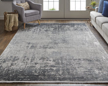 3' X 5' Taupe Ivory And Gold Abstract Power Loom Distressed Area Rug With Fringe