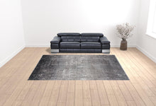 3' X 5' Taupe Ivory And Gold Abstract Power Loom Distressed Area Rug With Fringe