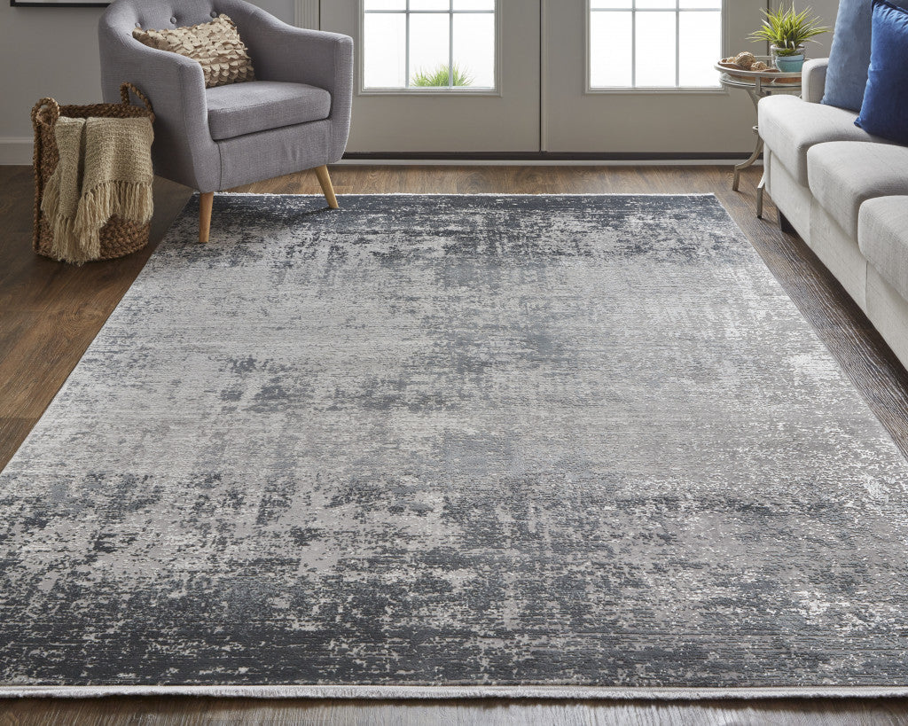 3' X 5' Taupe Ivory And Gold Abstract Power Loom Distressed Area Rug With Fringe