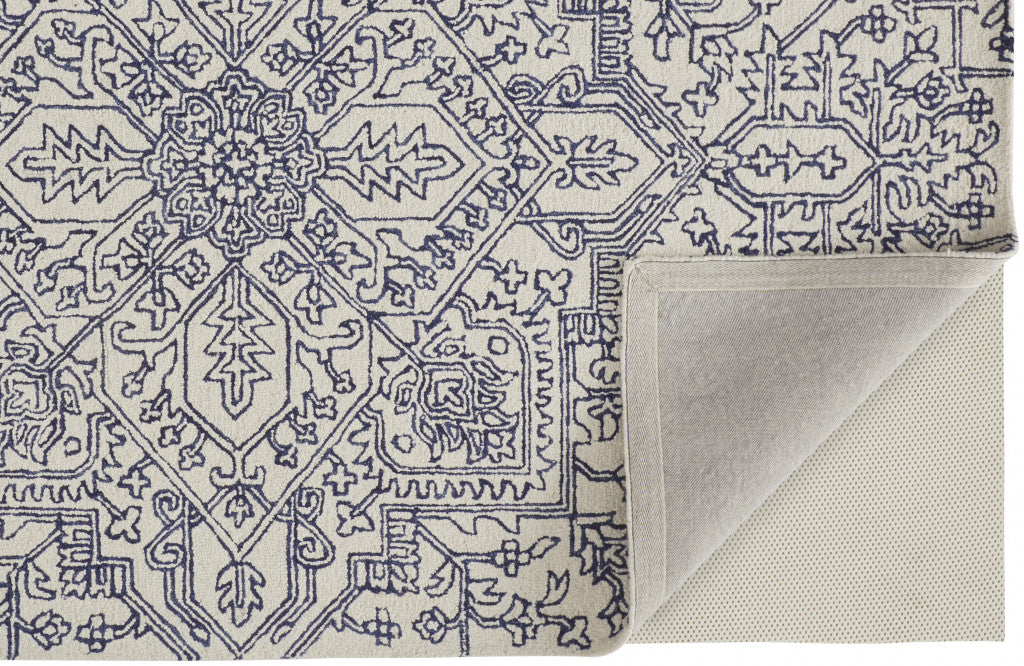 Ivory And Brown Wool Floral Tufted Handmade Stain Resistant Area Rug - 5' x 8'