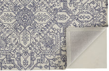 Ivory And Brown Wool Floral Tufted Handmade Stain Resistant Area Rug - 5' x 8'