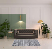 4' X 6' Ivory And Taupe Striped Hand Woven Stain Resistant Area Rug