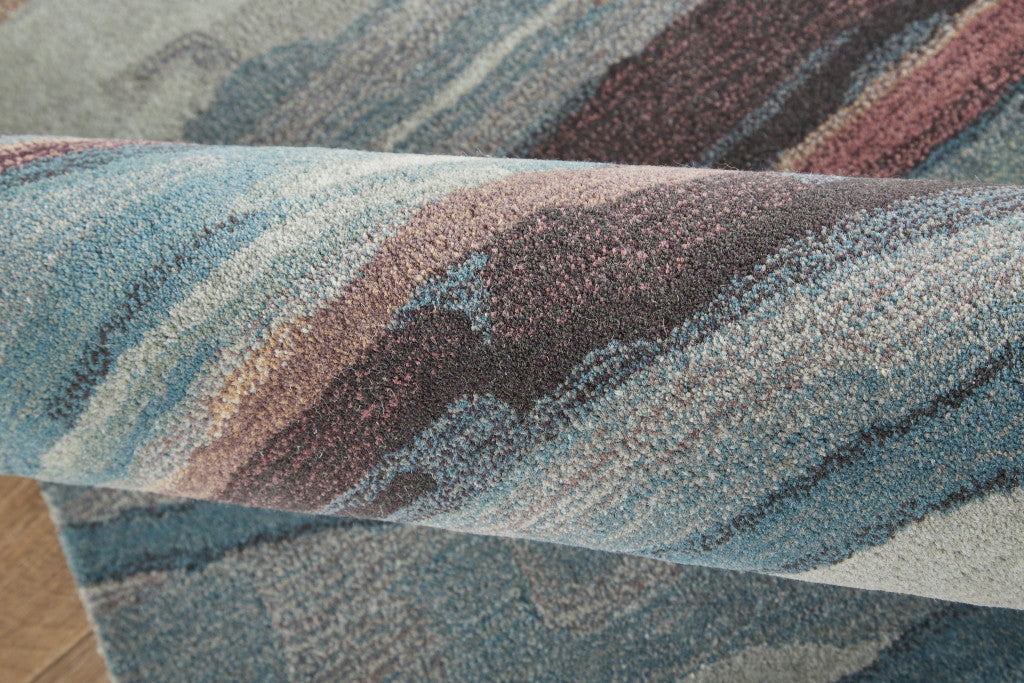 Red Pink And Blue Wool Abstract Tufted Handmade Stain Resistant Area Rug - 4' x 6'