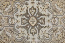 4' X 6' Brown Ivory And Tan Floral Power Loom Distressed Area Rug