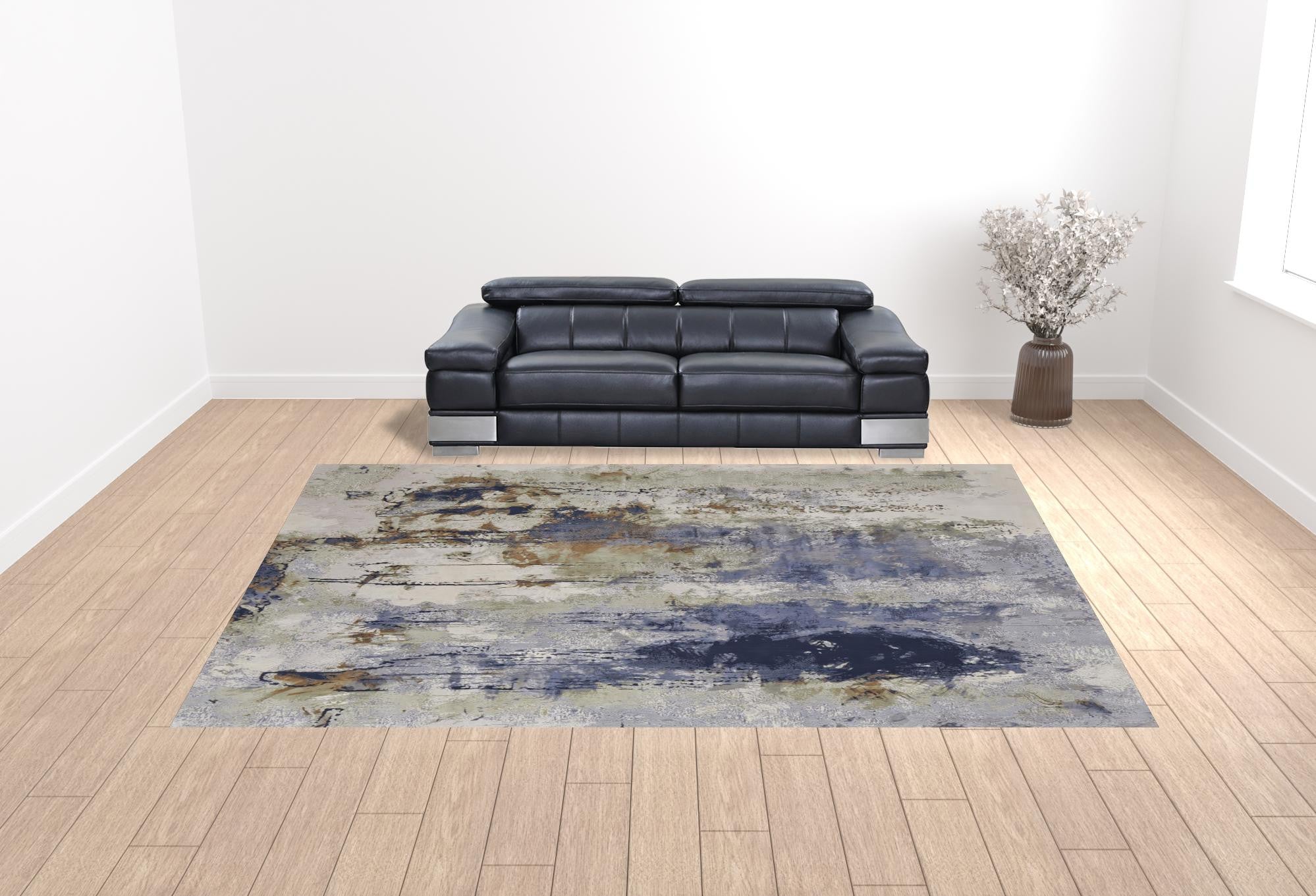 10' X 13' Blue Orange And Ivory Abstract Power Loom Area Rug