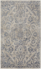 4' X 6' Blue Gray And Ivory Floral Power Loom Distressed Area Rug