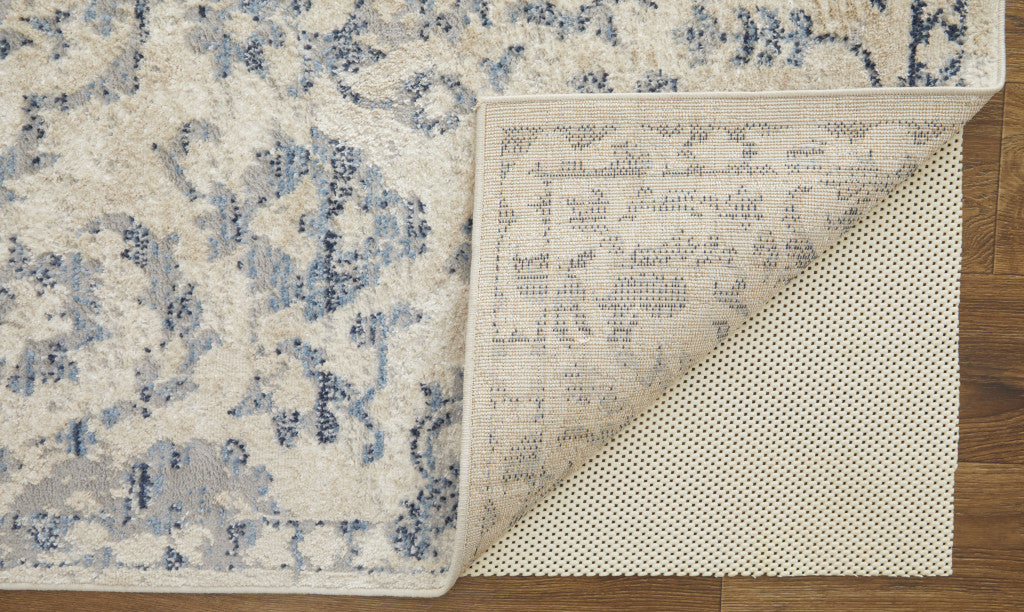 4' X 6' Blue Gray And Ivory Floral Power Loom Distressed Area Rug