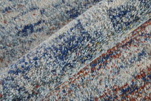 3' X 5' Blue Ivory And Orange Abstract Power Loom Stain Resistant Area Rug