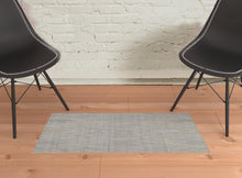 5' X 8' Gray And Ivory Abstract Hand Woven Area Rug