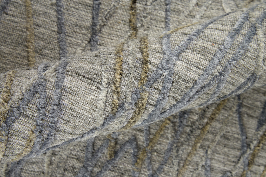 5' X 8' Gray And Ivory Abstract Hand Woven Area Rug