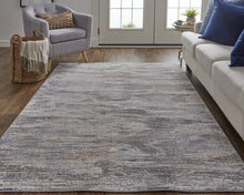 4' X 6' Tan Taupe And Gray Abstract Power Loom Distressed Stain Resistant Area Rug