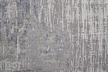 4' X 6' Taupe Tan And Blue Abstract Power Loom Distressed Stain Resistant Area Rug