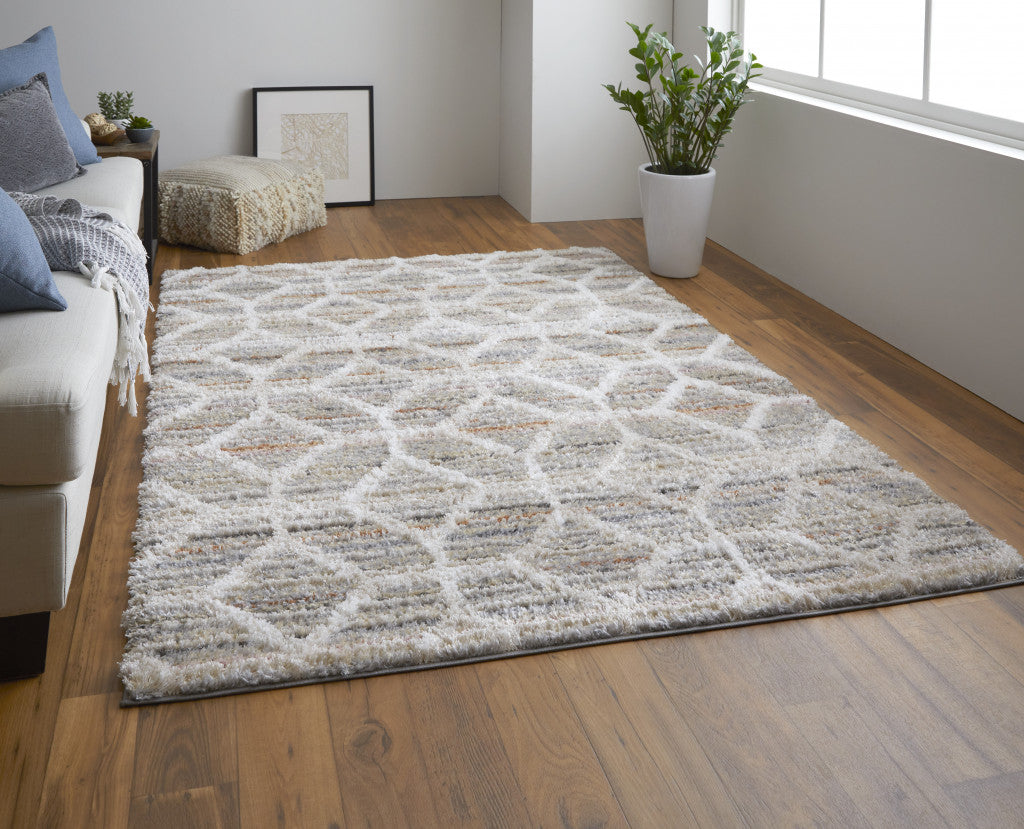 4' X 6' Tan Taupe And Ivory Geometric Power Loom Stain Resistant Area Rug