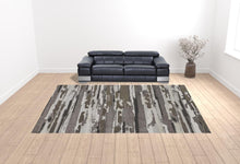 4' X 6' Brown And Ivory Abstract Power Loom Distressed Stain Resistant Area Rug
