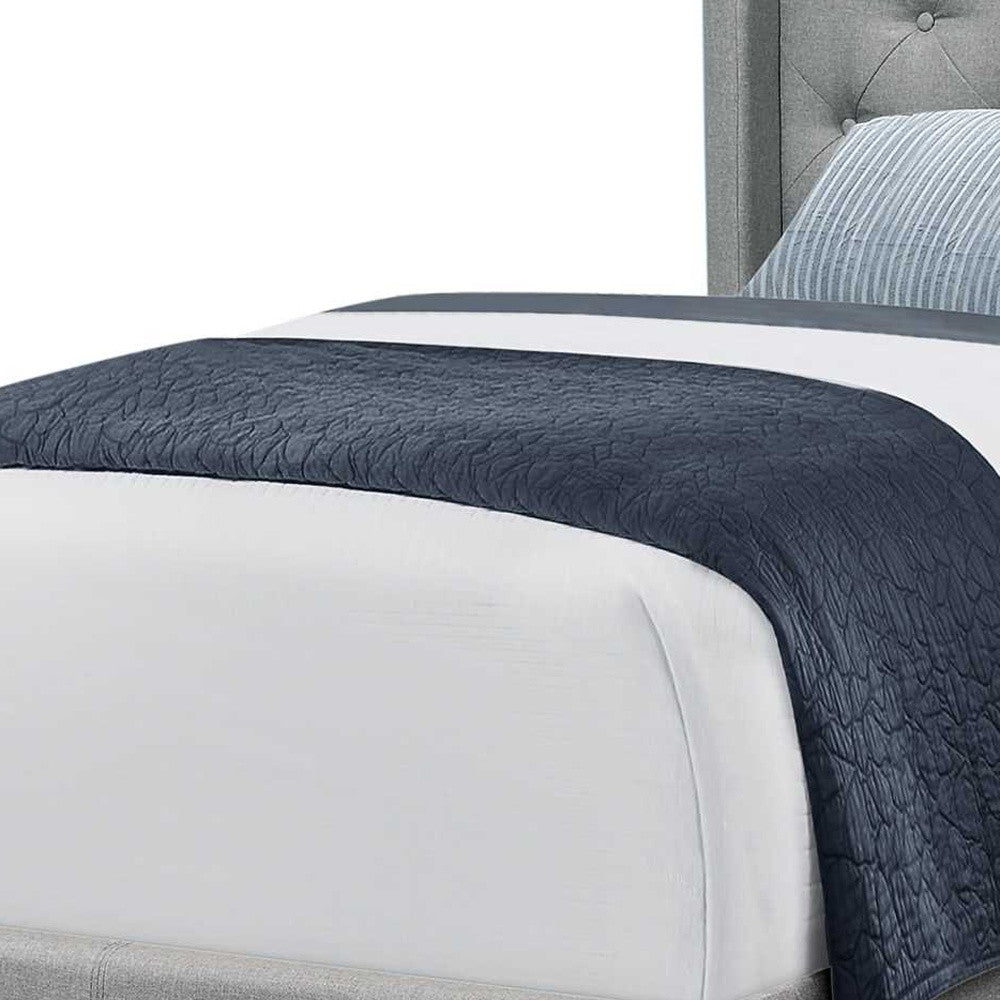 Tufted Grey Standard Bed Upholstered With Nailhead Trim And With Headboard