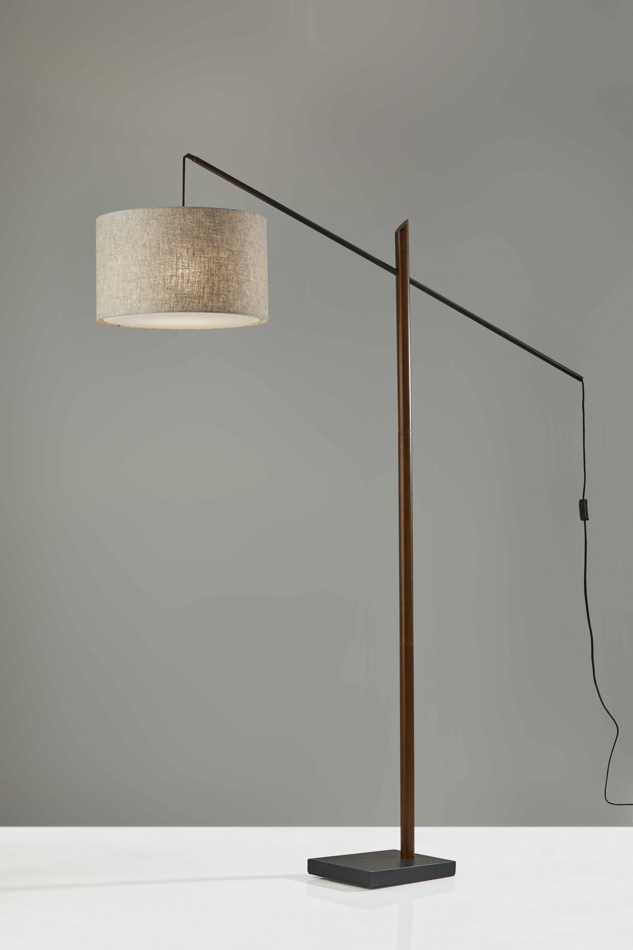Black Swing Arm Floor Lamp With Beige Solid Color Drum Shade 77"