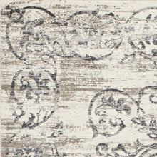 10'X13' Ivory Grey Machine Woven Distressed Floral Traditional Indoor Area Rug