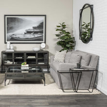 Espejo de pared con marco de metal y madera negro redondo sobre cuadrado de 46