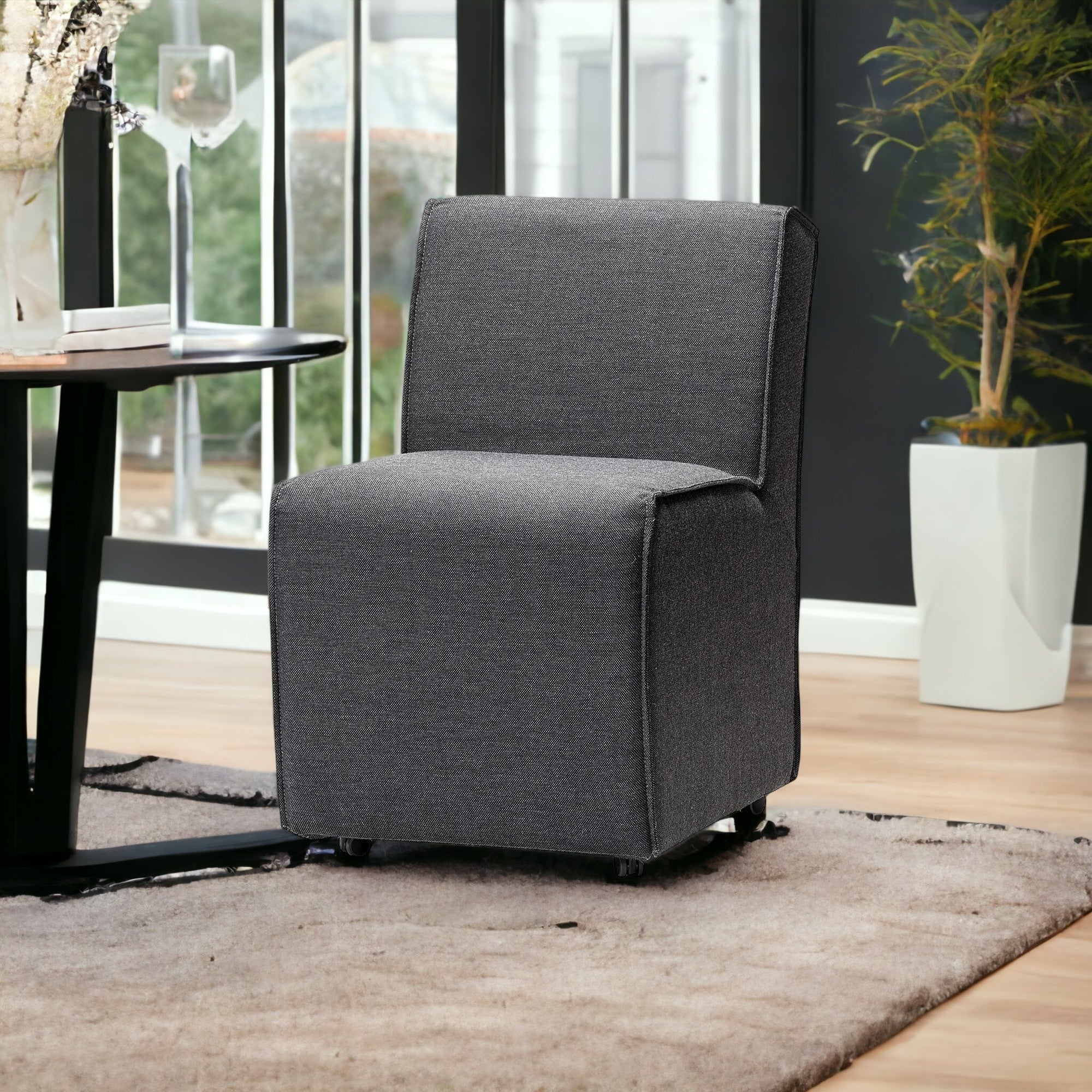 Fully Upholstered Grey Fabric Dining Chair On Casters