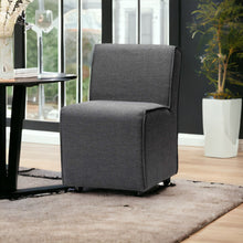 Fully Upholstered Grey Fabric Dining Chair On Casters