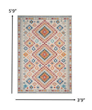 2’ X 6’ Ivory And Red Diamonds Runner Rug