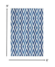 4’ X 6’ Ivory And Blue Diamond Area Rug