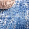 4’ X 6’ Blue And Ivory Abstract Splash Area Rug