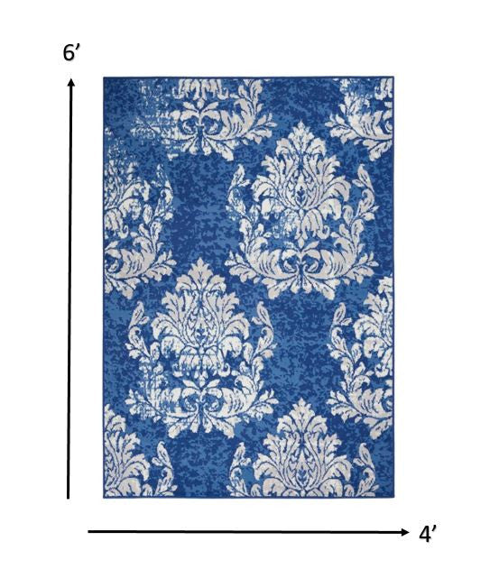 4’ X 6’ Ivory And Navy Damask Area Rug