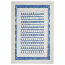 4’ X 6’ Ivory And Blue Geometric Area Rug