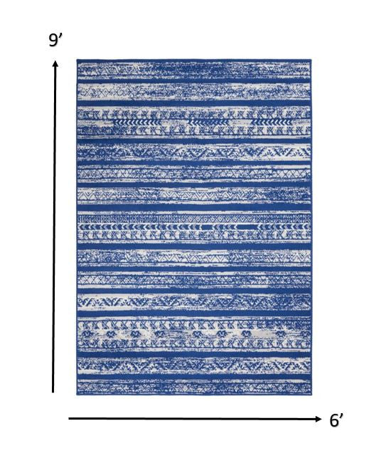 4’ X 6’ Ivory And Blue Distressed Area Rug