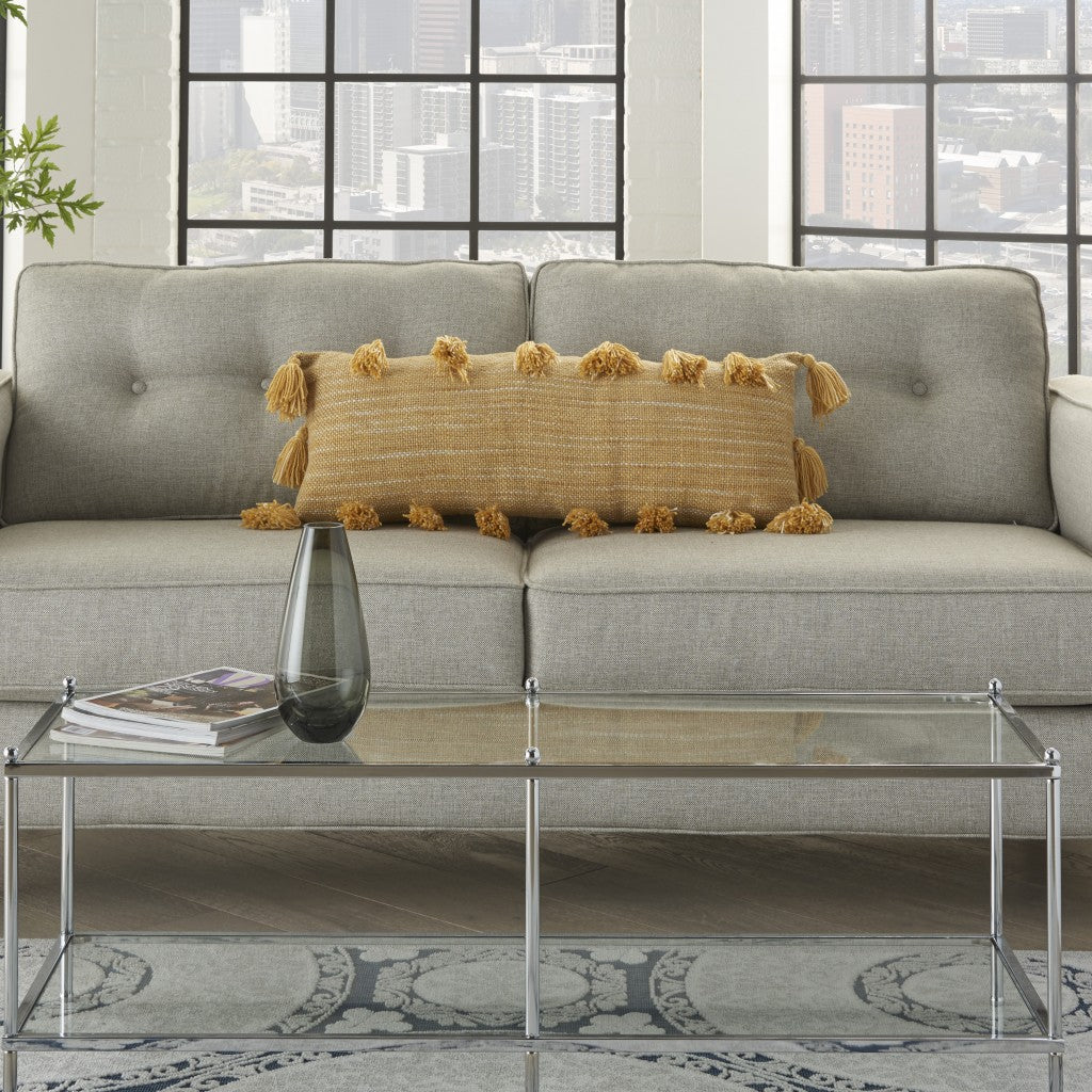 Almohada lumbar con borlas amarillas