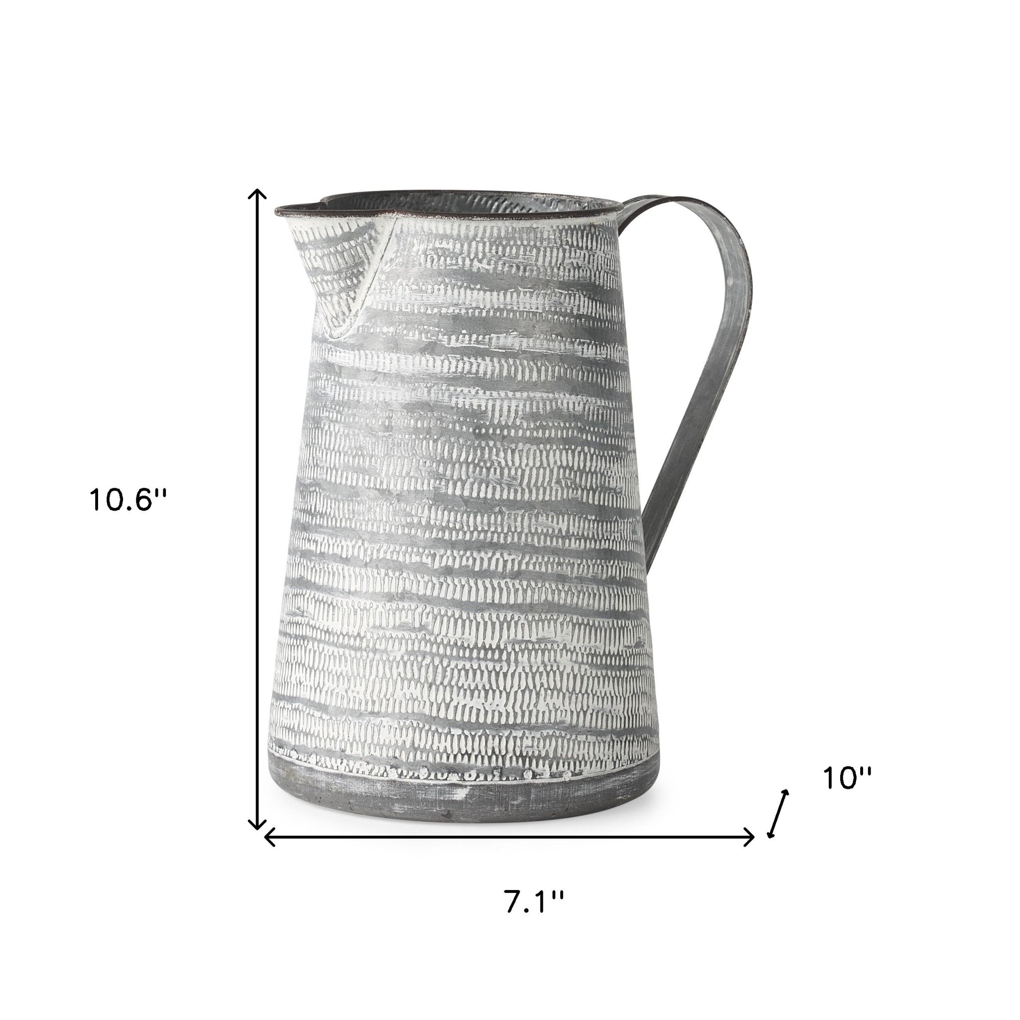Gray And White Patterned Metal Jug