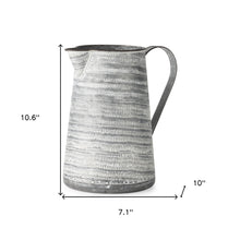Gray And White Patterned Metal Jug