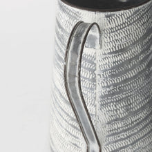 Gray And White Patterned Metal Jug
