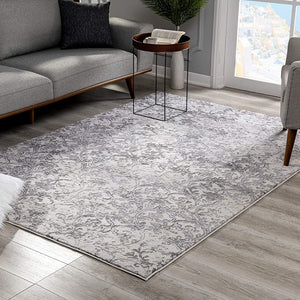 5’ X 8’ Cream And Gray Faded Filigree Area Rug