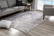 5’ X 8’ Cream And Gray Faded Filigree Area Rug
