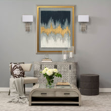 Otomana gris oscuro con detalles de metal