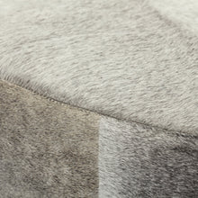 Otomana Redonda De Piel De Vaca Gris Con Base De Metal