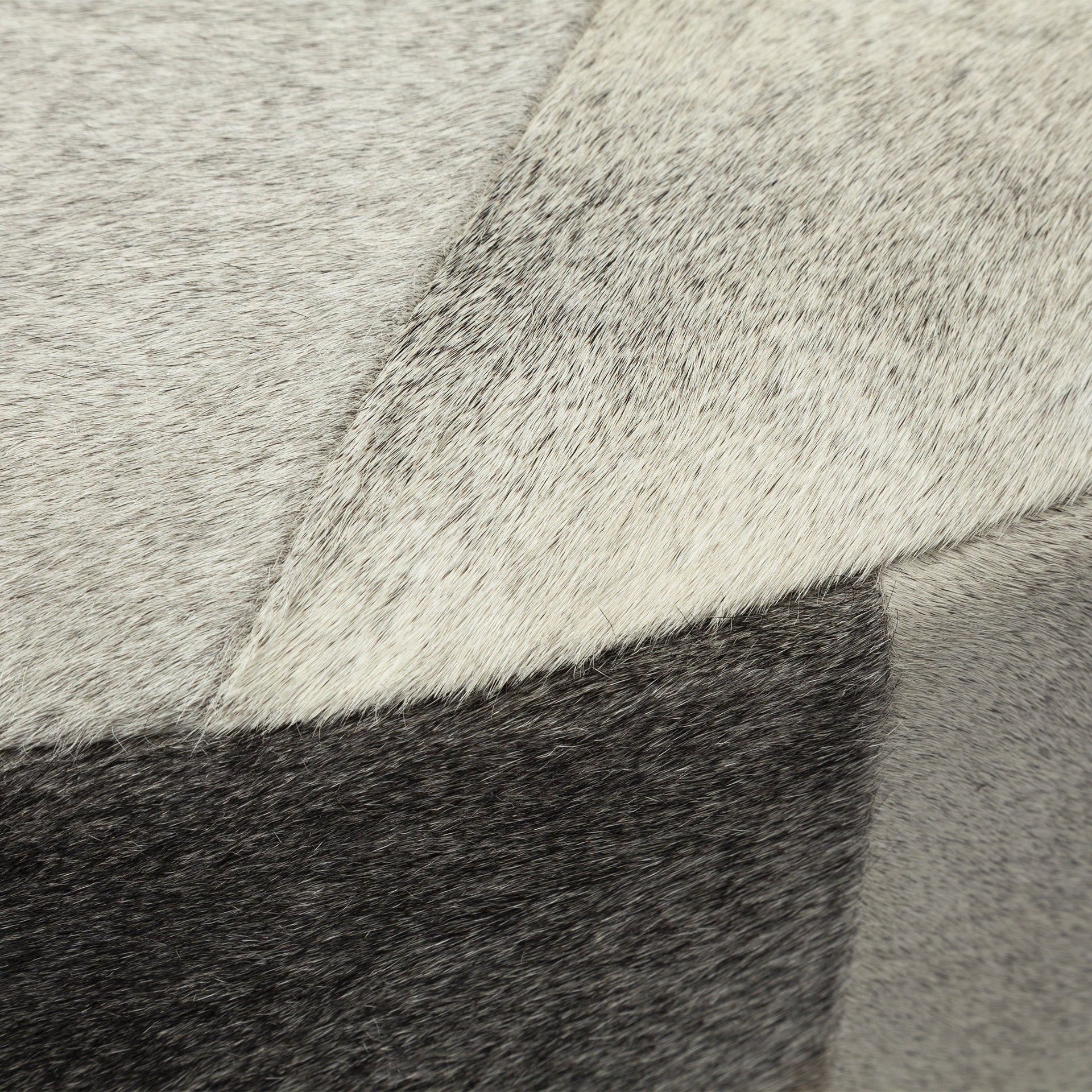 Otomana Redonda De Piel De Vaca Gris Con Base De Metal