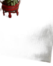 5’ x 8’ Tan and Ivory Grid Area Rug