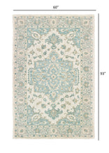 5’ x 8’ Turquoise and Cream Medallion Area Rug