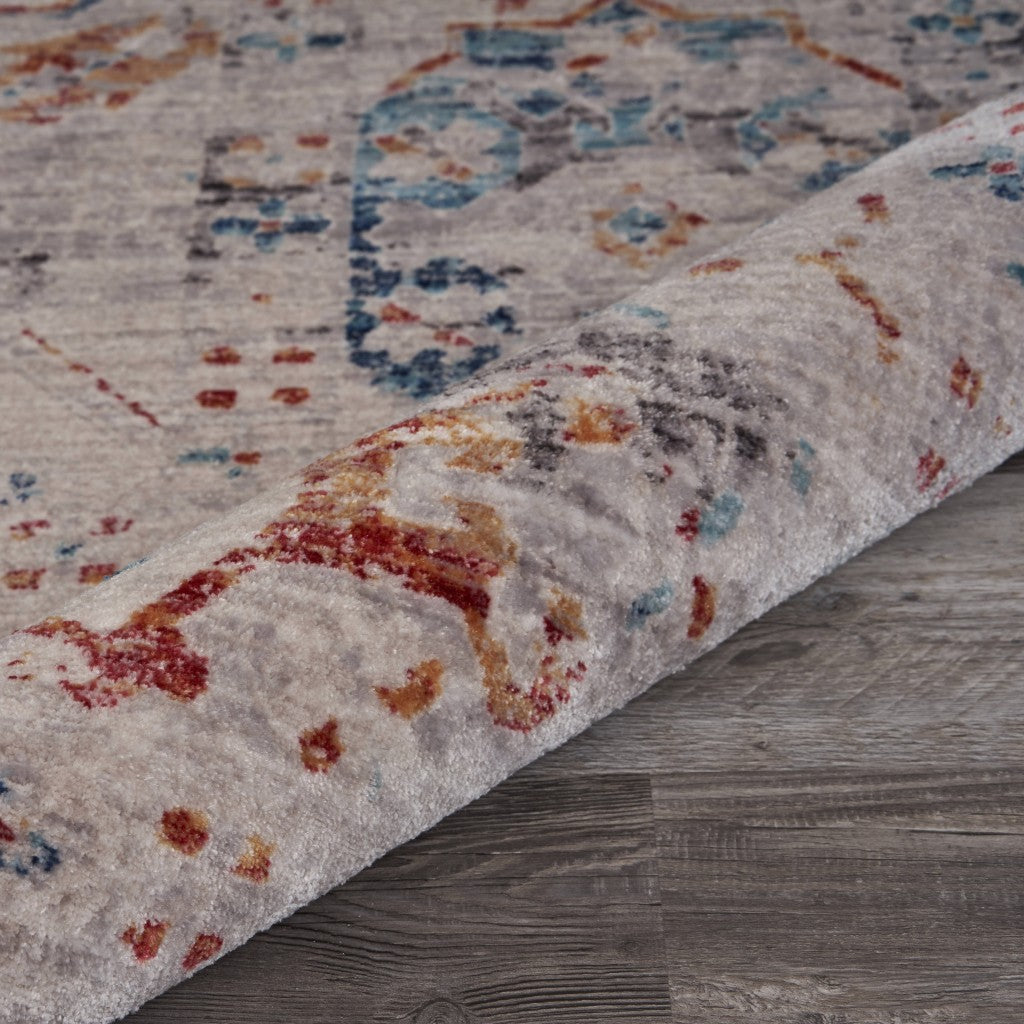 5’ x 8’ Beige Distressed Floral Area Rug