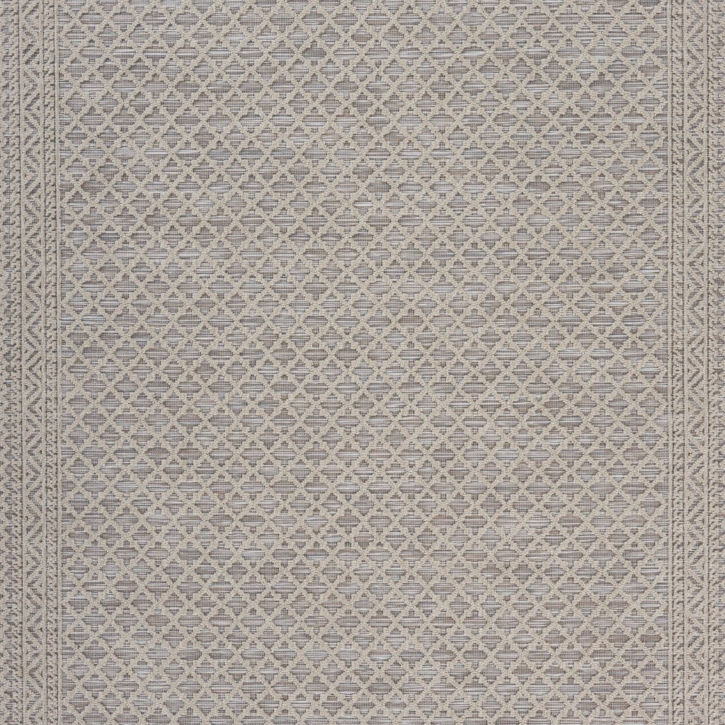 5' X 7' Tan/Brown Indoor Outdoor Area Rug