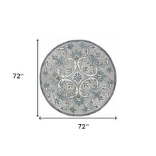 6’ Round Gray and White Filigree Area Rug