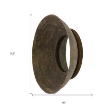 Espejo de pared con cuenco de metal pequeño