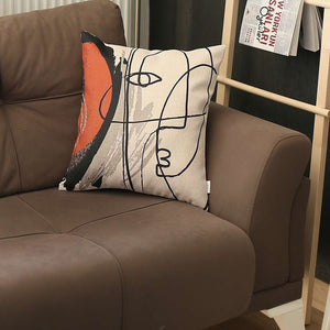 紅色和奶油色抽象筆劃抱枕