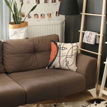 紅色和奶油色抽象筆劃抱枕